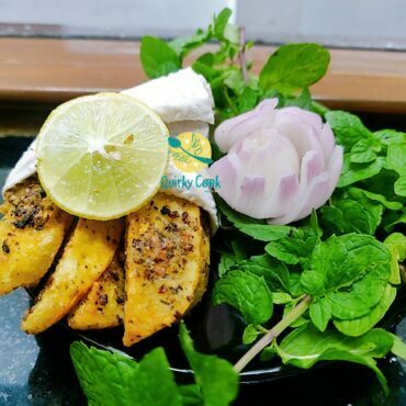 Quick and easy potato wedges served with some lemon